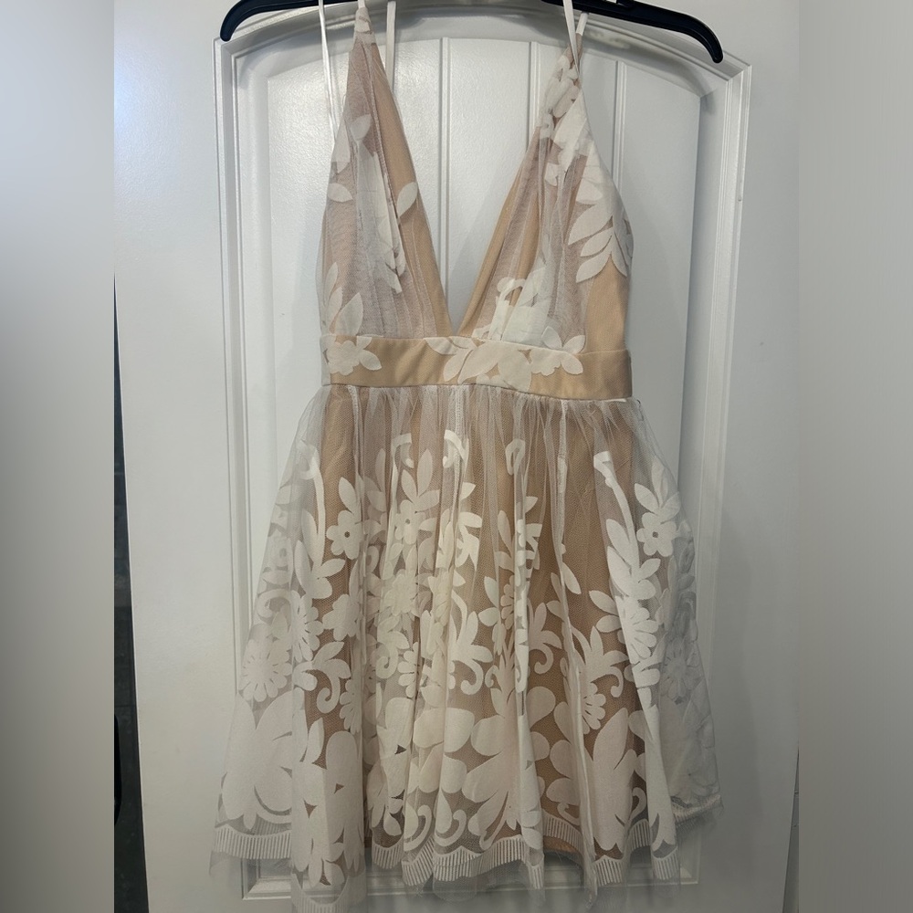 White lace dress with nude underlay